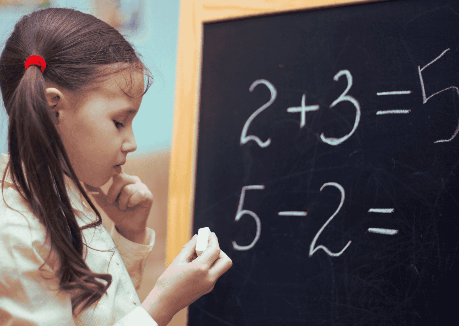 a girl solving maths problem 