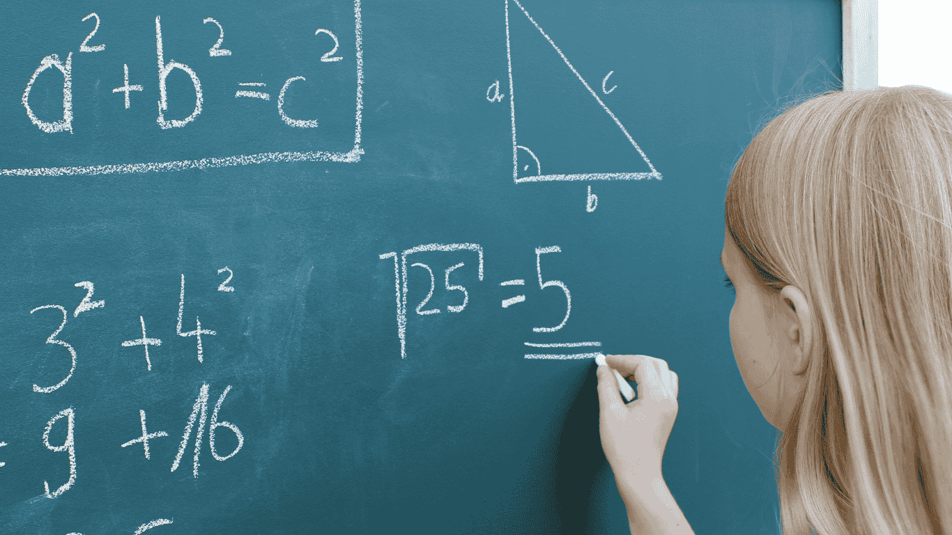 A little girl solving a math problem